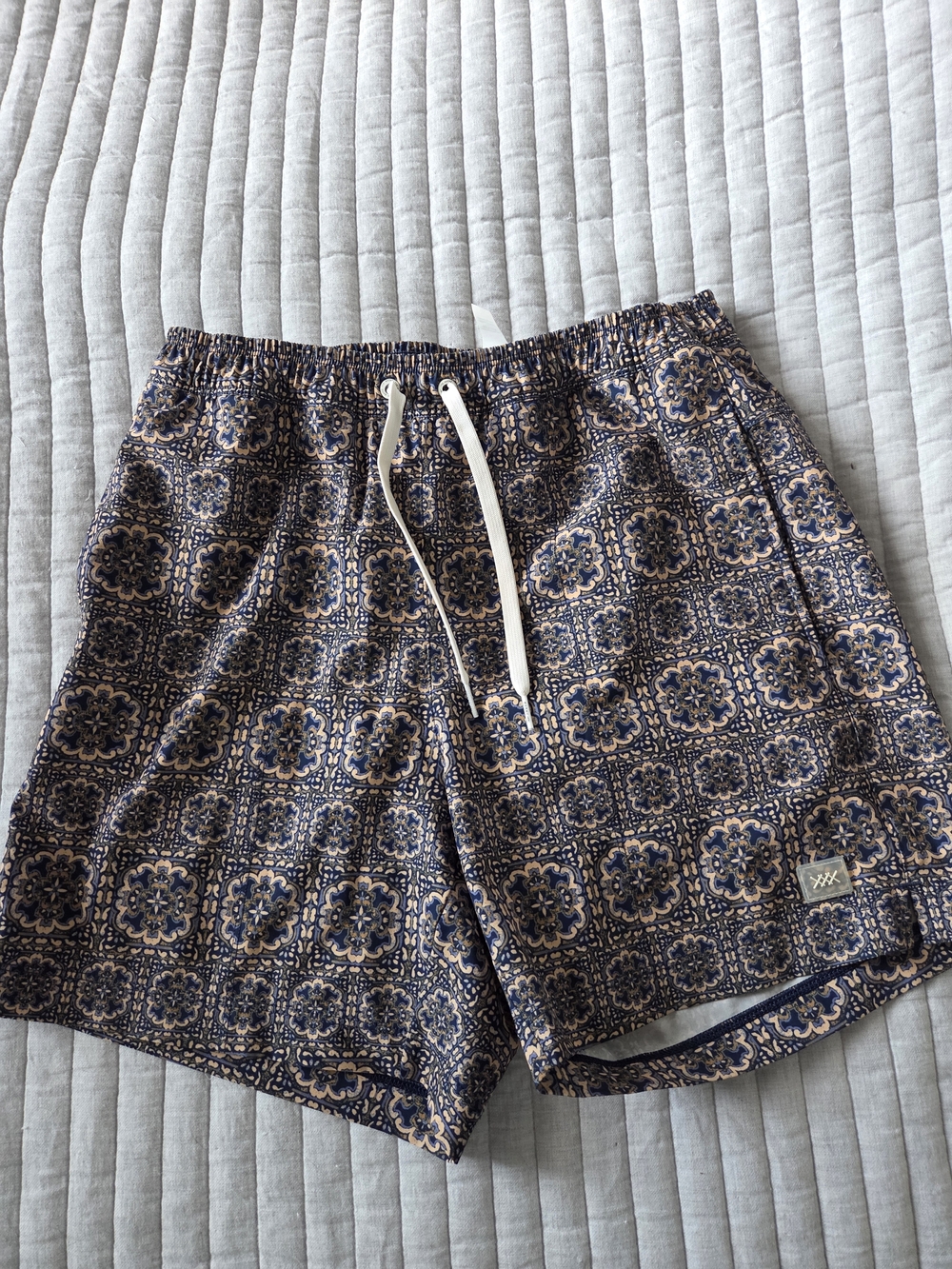 RHONE Navy and Tan Medallion Swim Trunks with White Drawstring